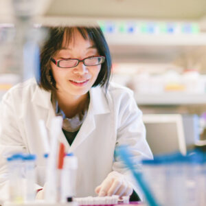 Female scientist working in a laboratory, representing life sciences executive search and life science staffing services